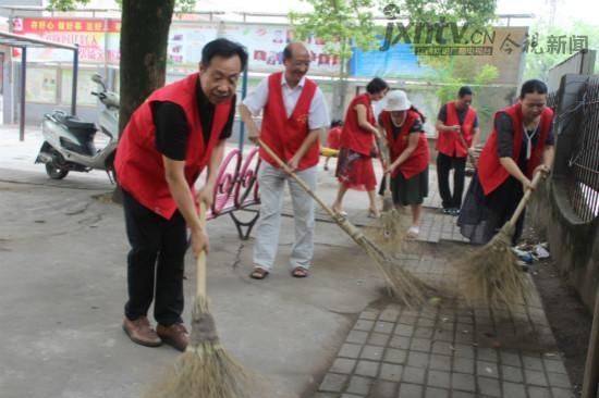新余市电工厂社区组织志愿者义务打扫卫生活动