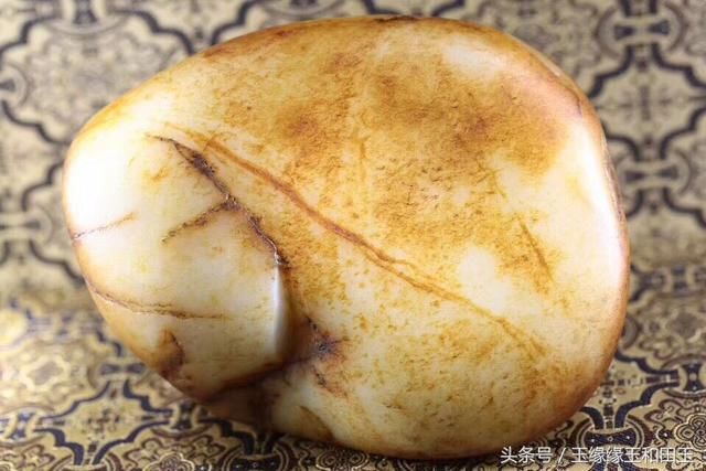 新疆和田玉籽料作品：屠龙刀