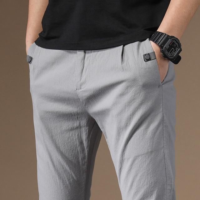 干净利落的男士休闲裤 t016b5b0fba09f16840.jpg