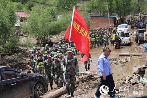 定西市组织七县区民兵奔赴岷县救灾