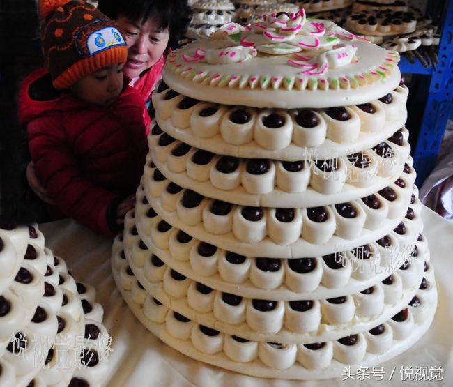 春节,这里农民为什么要蒸100斤重的大花糕呐?理由有点